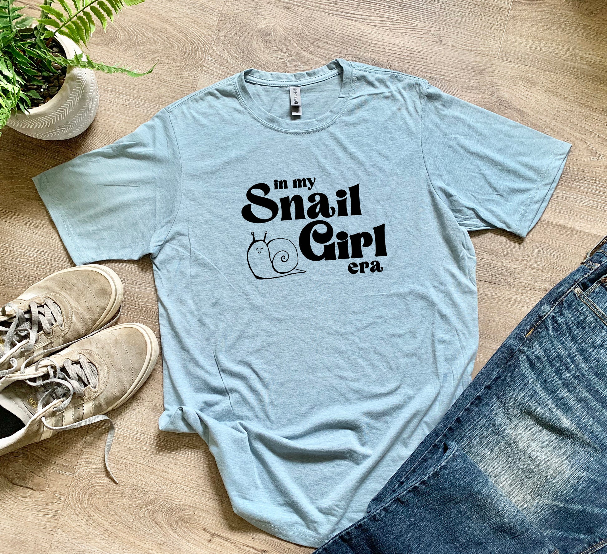 a t - shirt that says i'm my snail girl on it