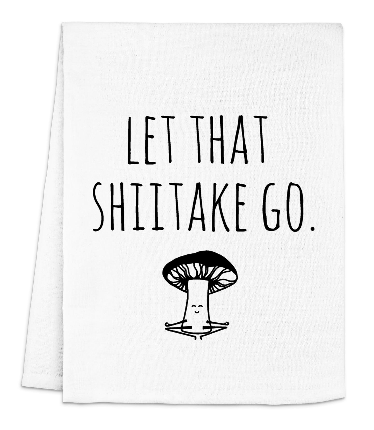a white dish towel with the words let that shiitake go printed on it