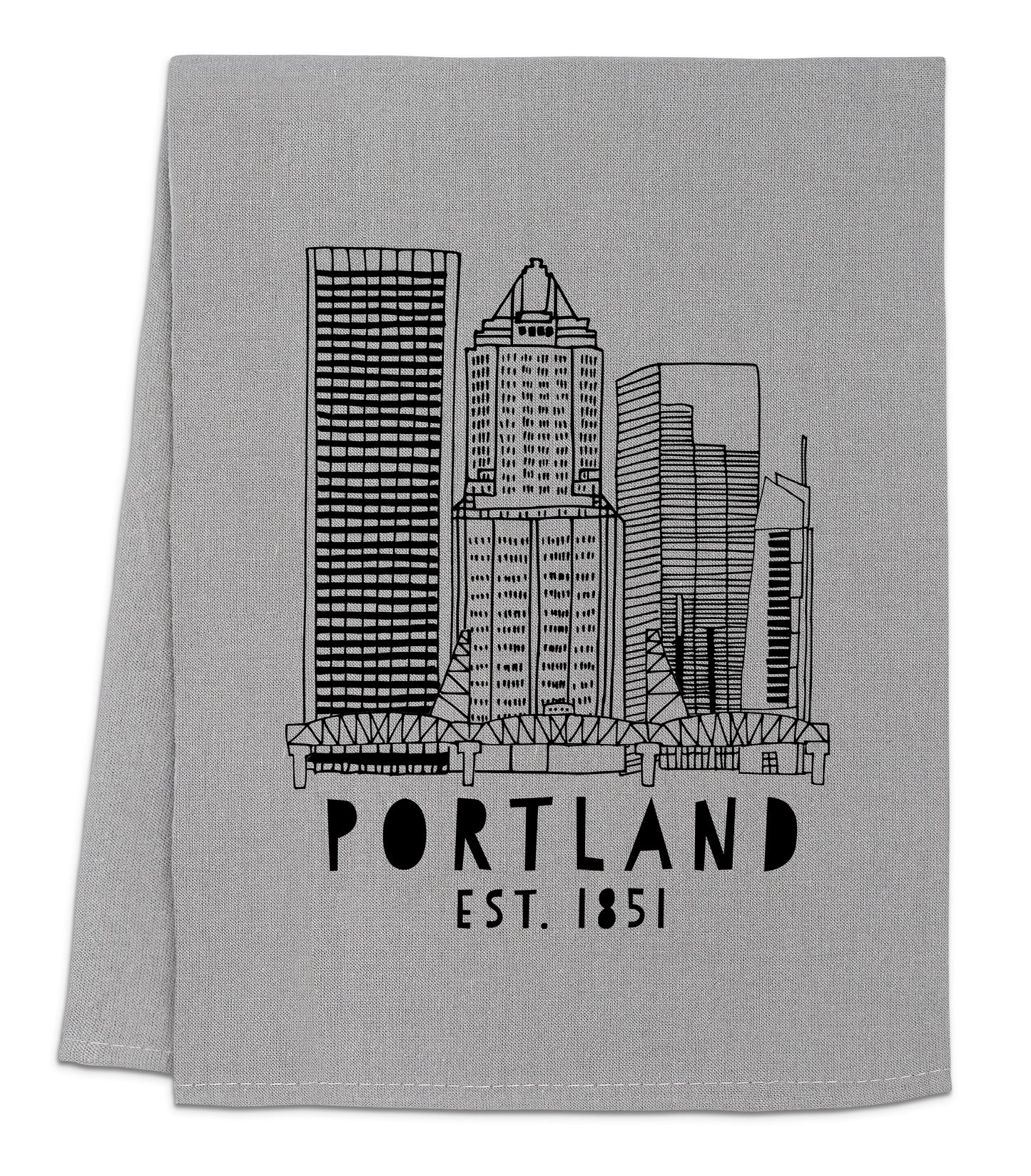 a gray towel with a black and white picture of a city