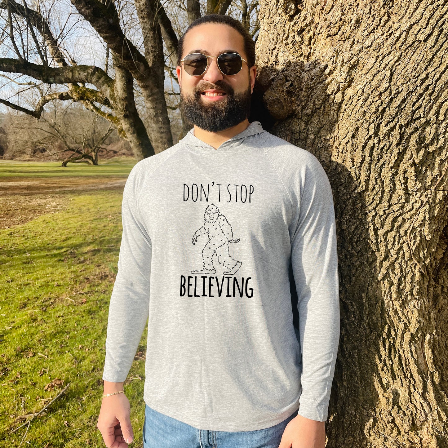 Don't Stop Believing (Bigfoot/ Sasquatch) - Unisex T-Shirt Hoodie - Heather Gray