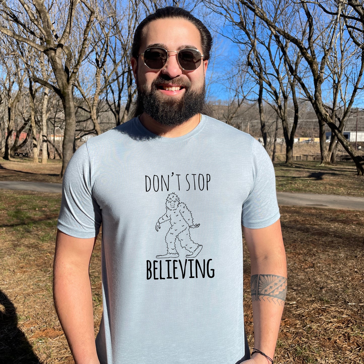 Don't Stop Believing (Bigfoot/ Sasquatch) - Men's / Unisex Tee - Stonewash Blue or Sage