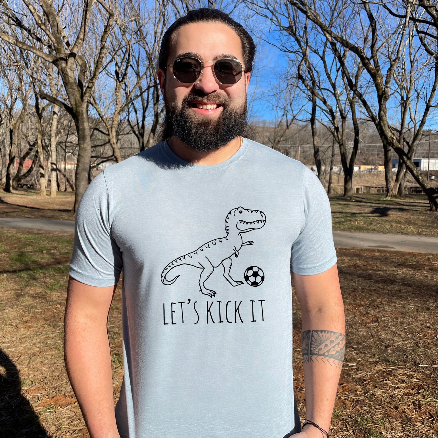 Let's Kick It (Soccer, Dinosaur) - Men's / Unisex Tee - Stonewash Blue or Sage