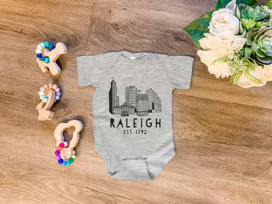 Raleigh Skyline (NC) - Onesie - Heather Gray, Chill, or Lavender