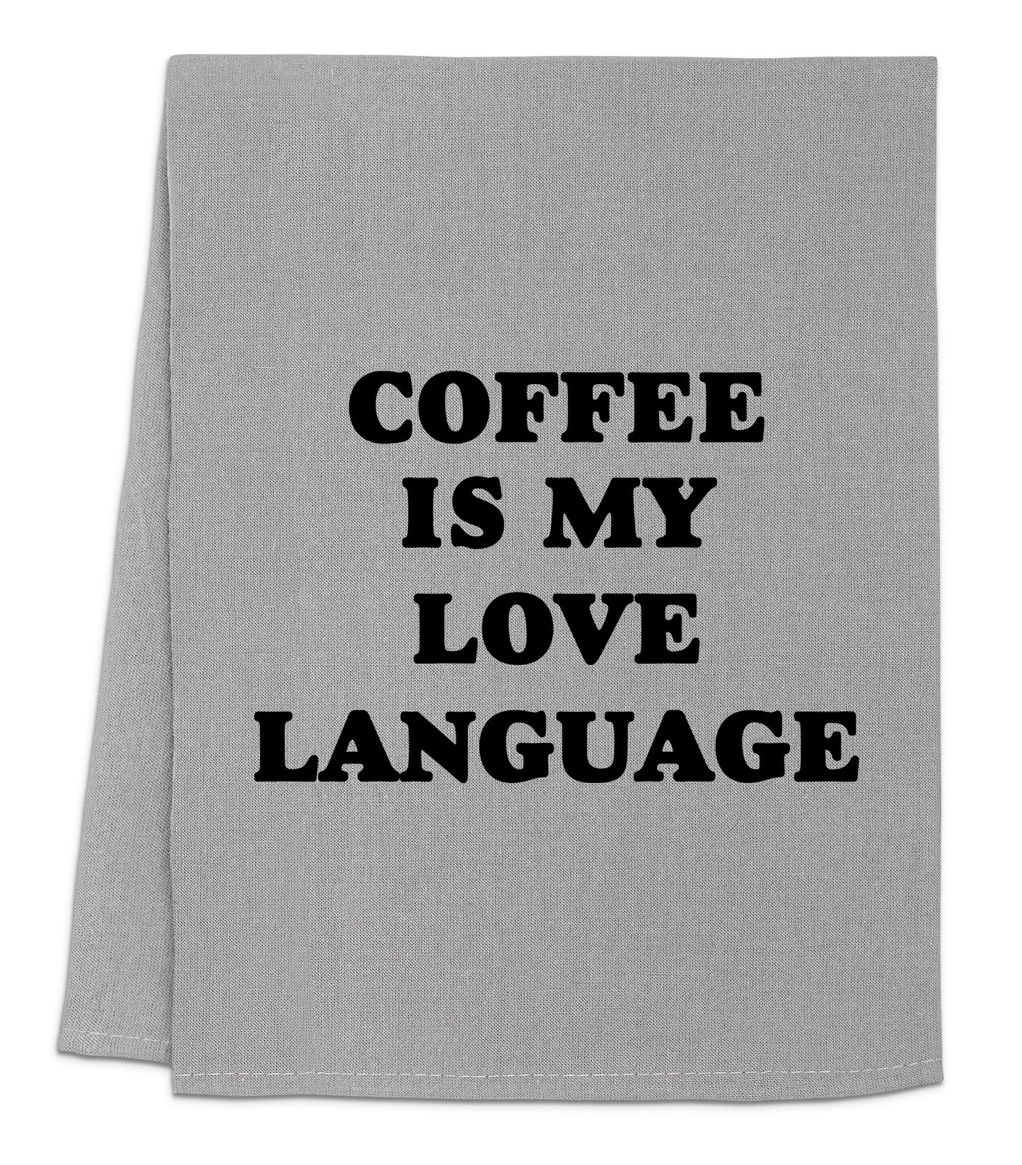 a gray towel with black lettering that says coffee is my love language