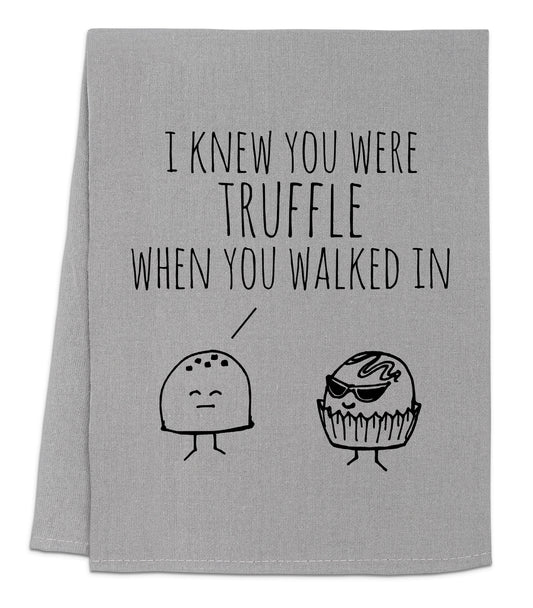 a towel with a cartoon of a cupcake and a muffin