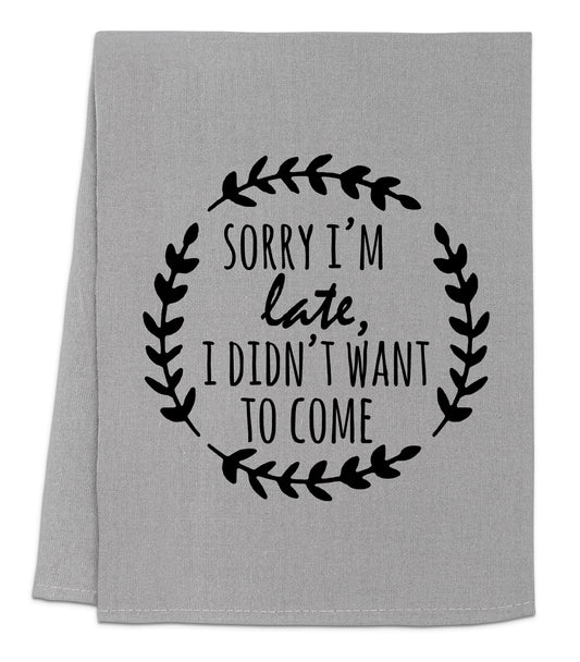a gray towel with black lettering that says sorry i'm late, i didn