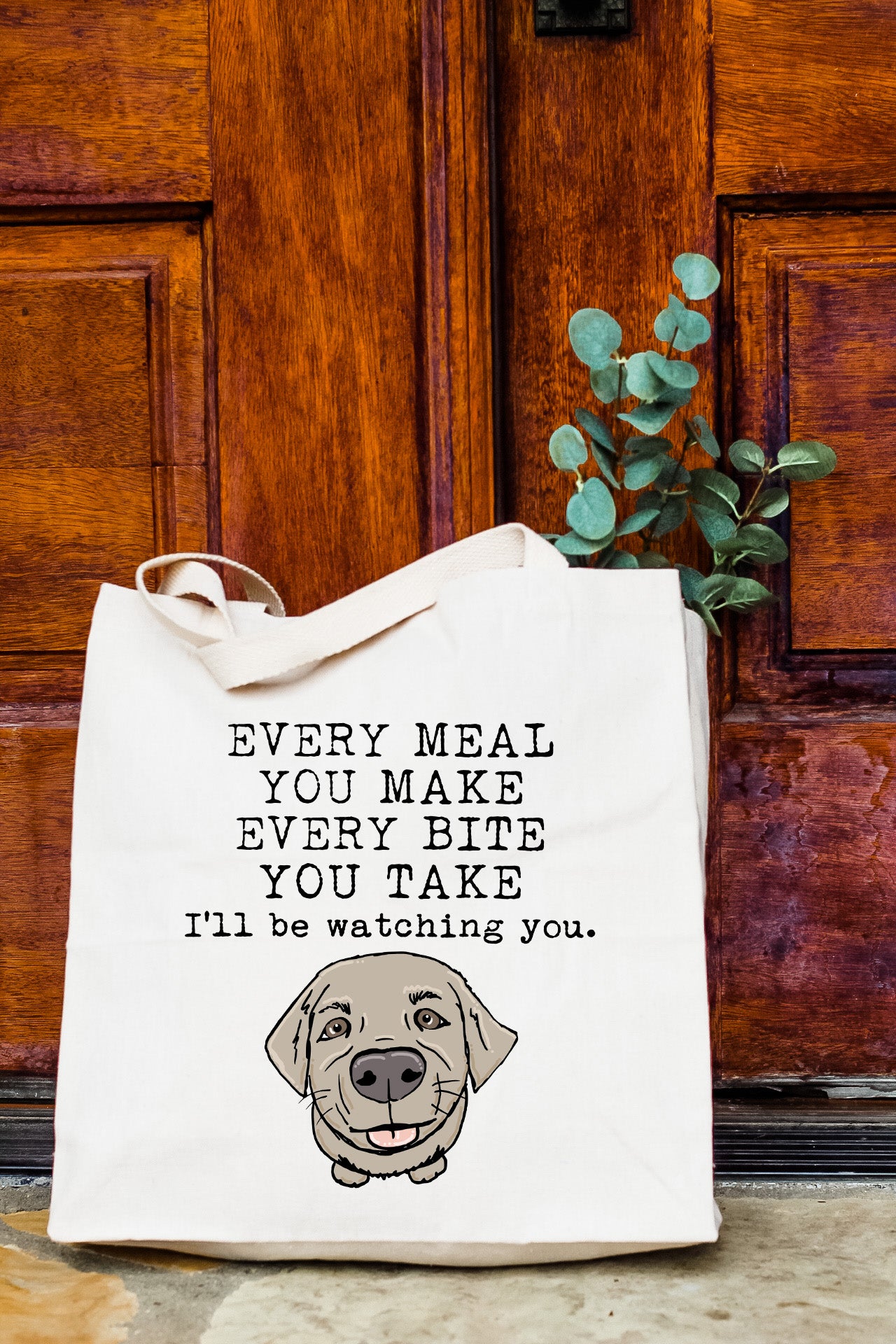 a tote bag with a picture of a dog on it