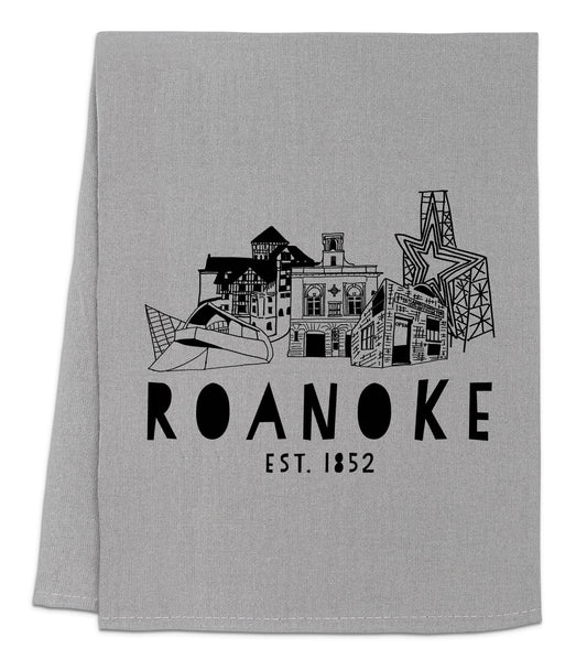 a gray towel with a black and white image of a building