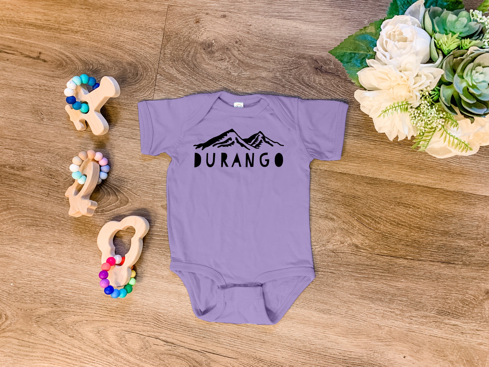 a purple onesuit with the word durano on it
