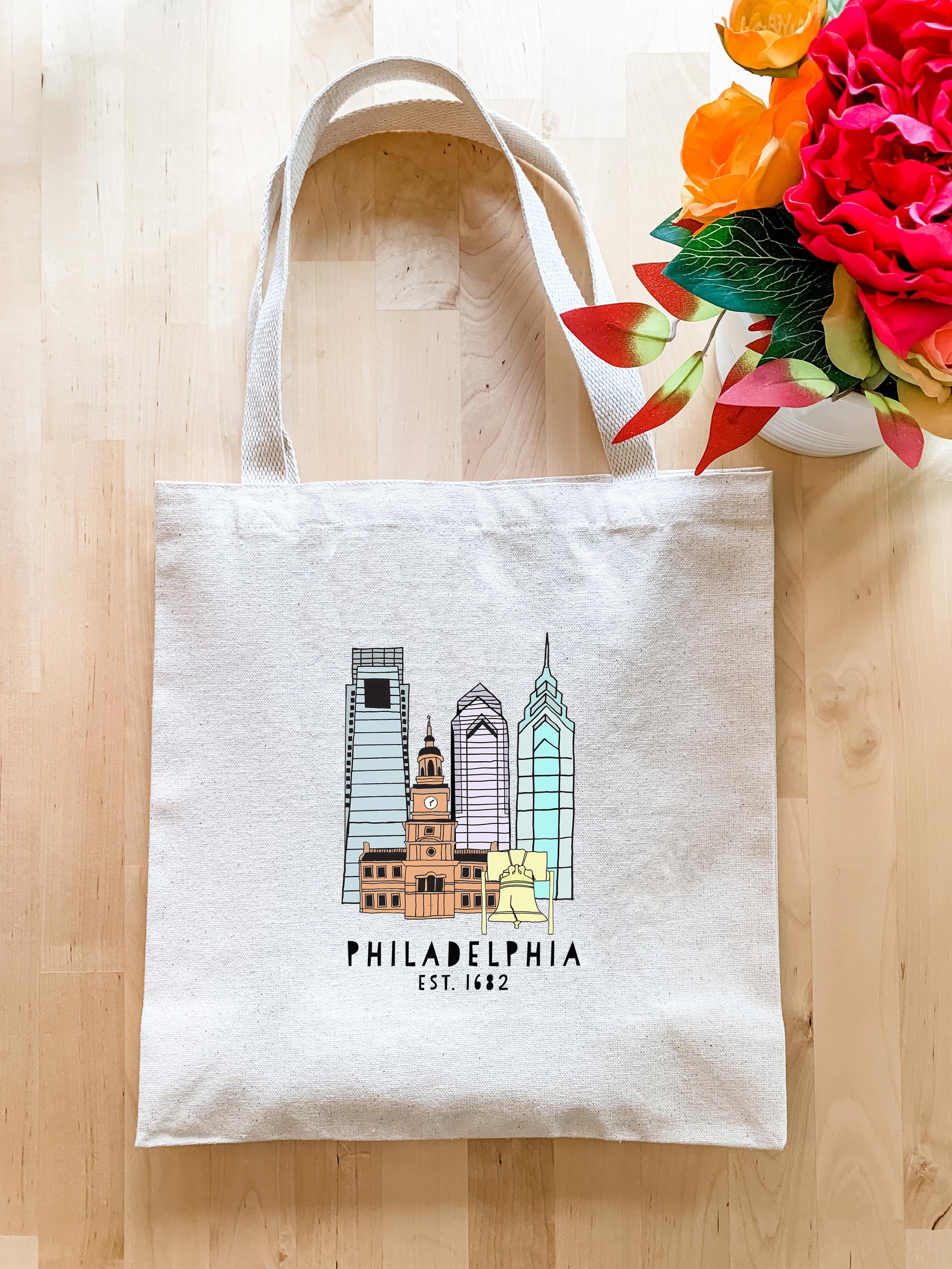 a white bag with a picture of philadelphia on it