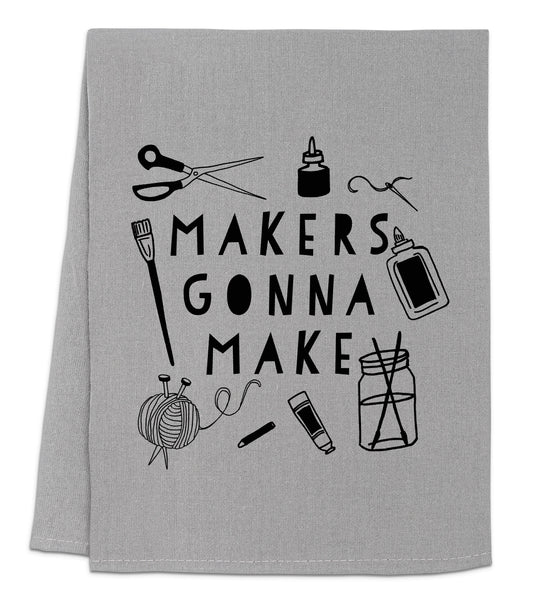 a gray towel with the words makers gonna make on it