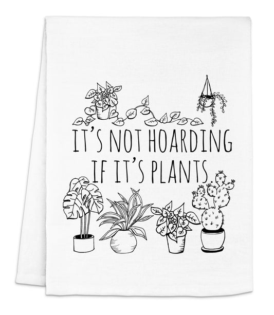 a white dish towel with black lettering that says it's not hoarding if