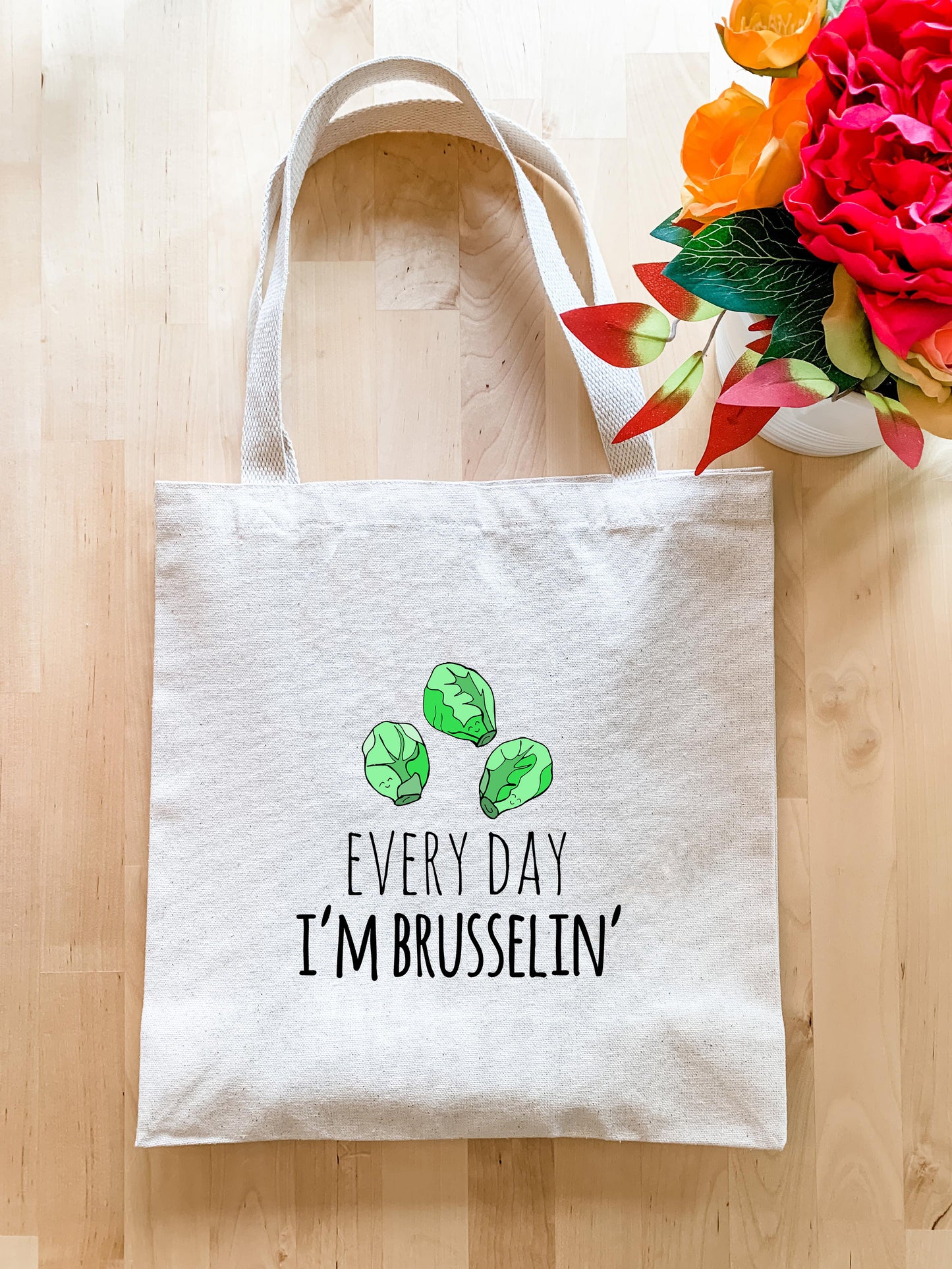 a white tote bag with the words every day i'm brussels on it
