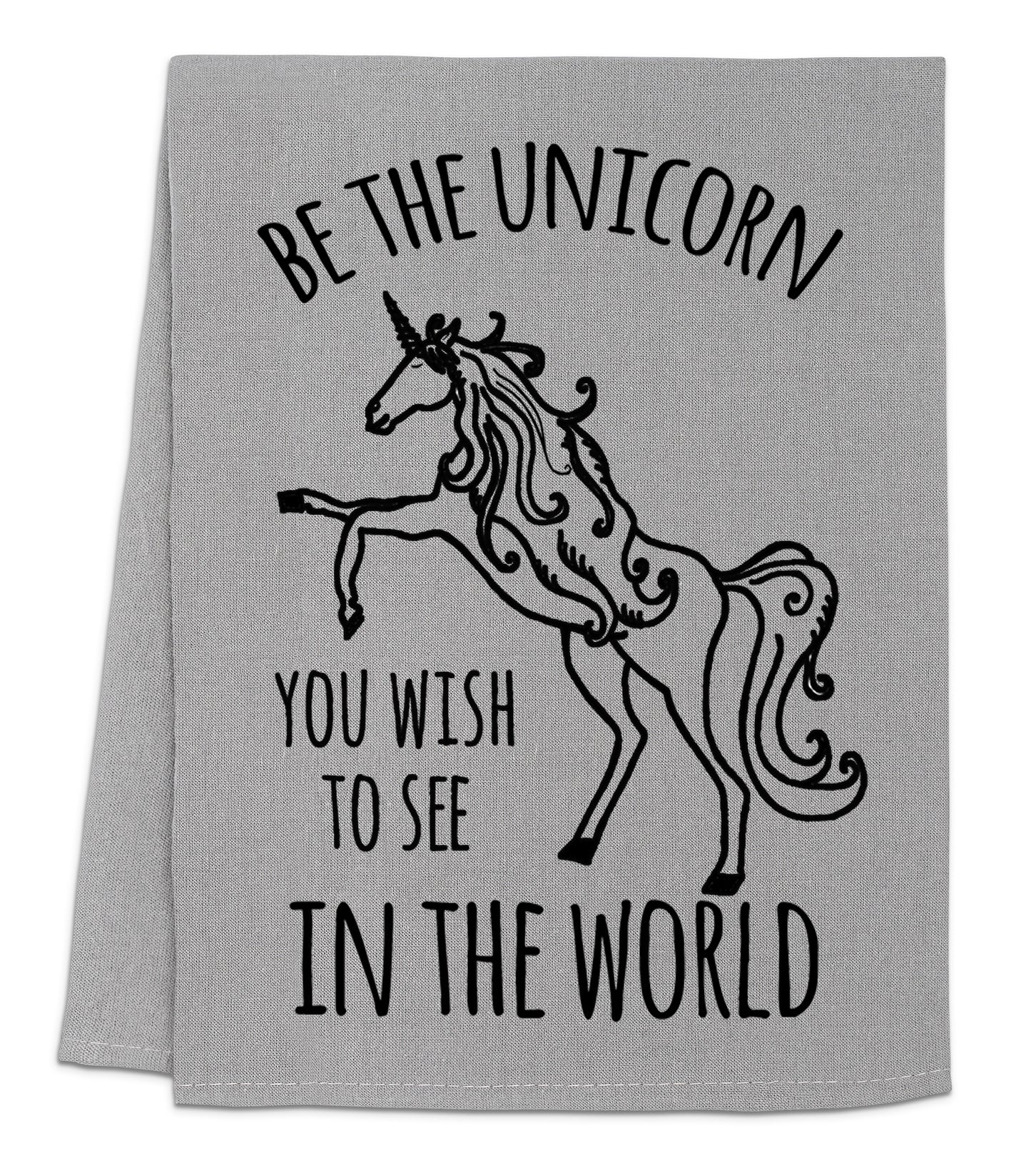 a towel with a unicorn on it that says be the unicorn you wish to see