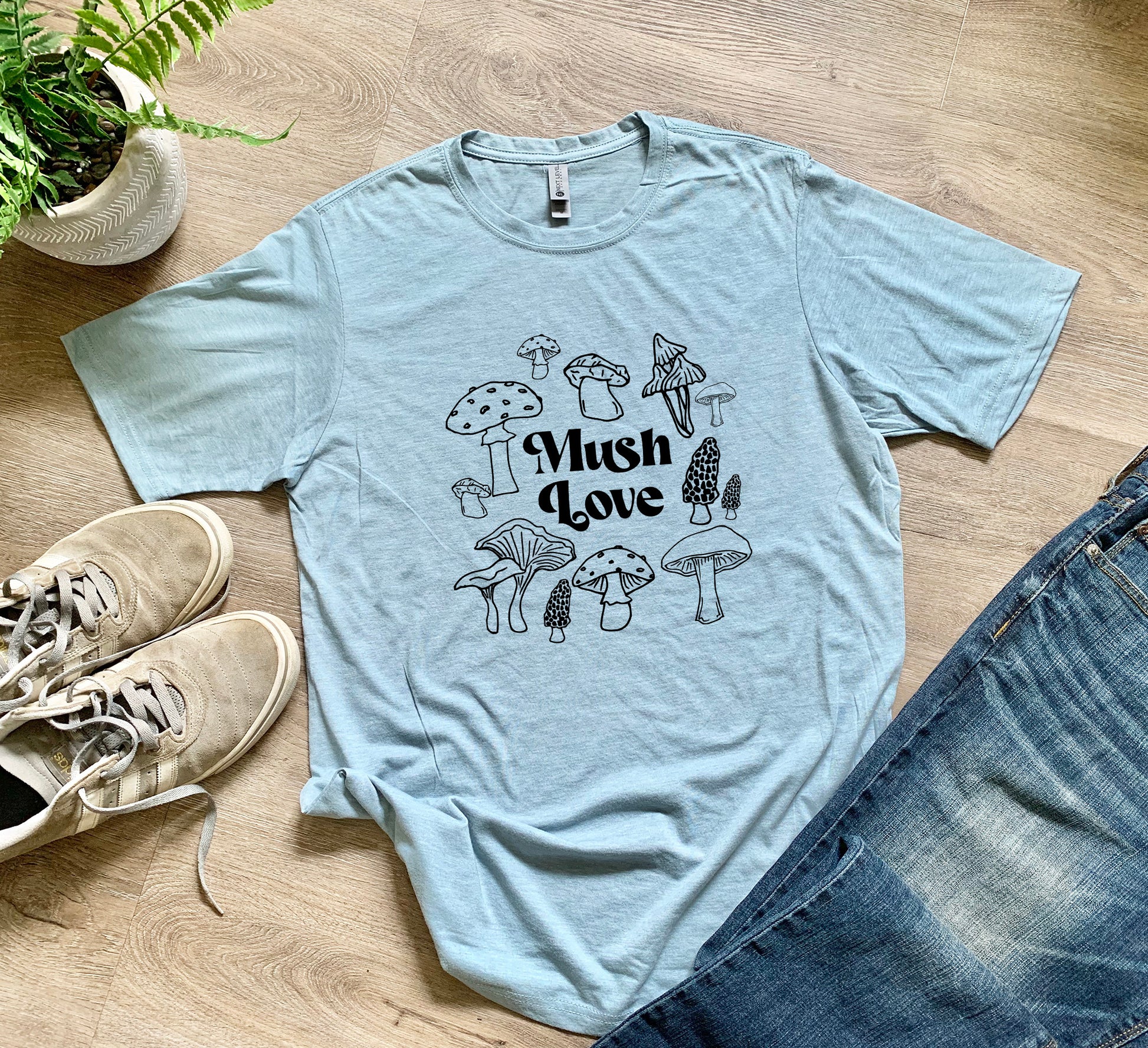 a t - shirt that says mush love surrounded by mushrooms