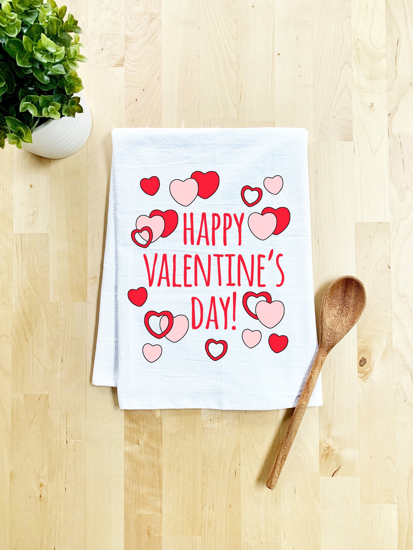 a tea towel that says happy valentine's day on it