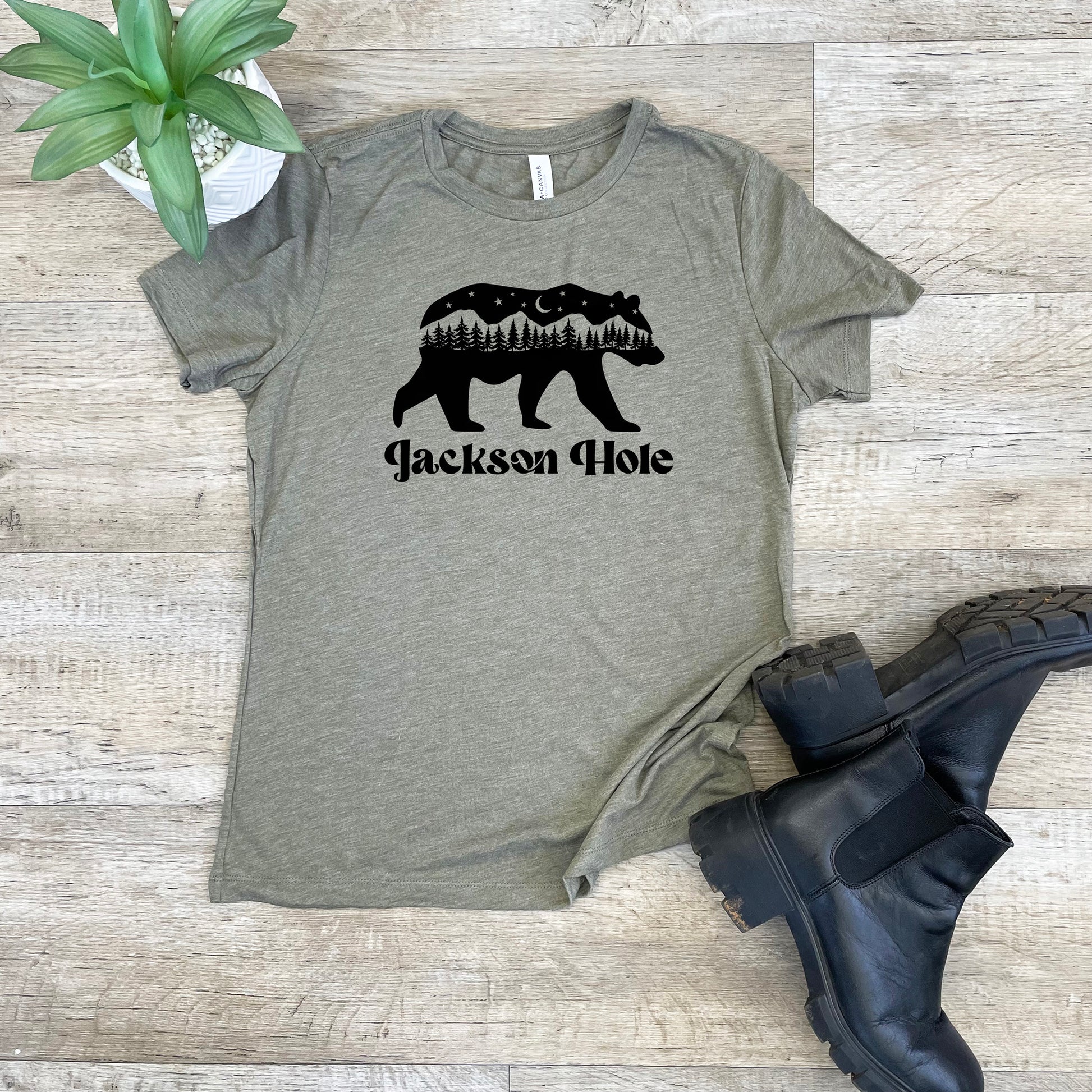 a t - shirt with a bear and trees on it