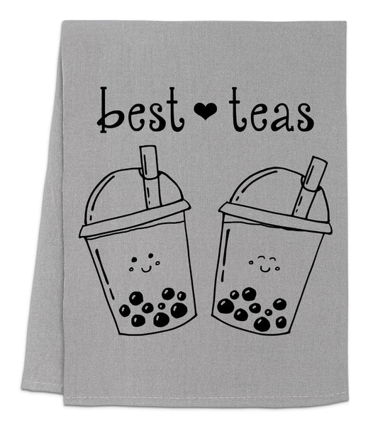 a tea towel with two cups of tea on it