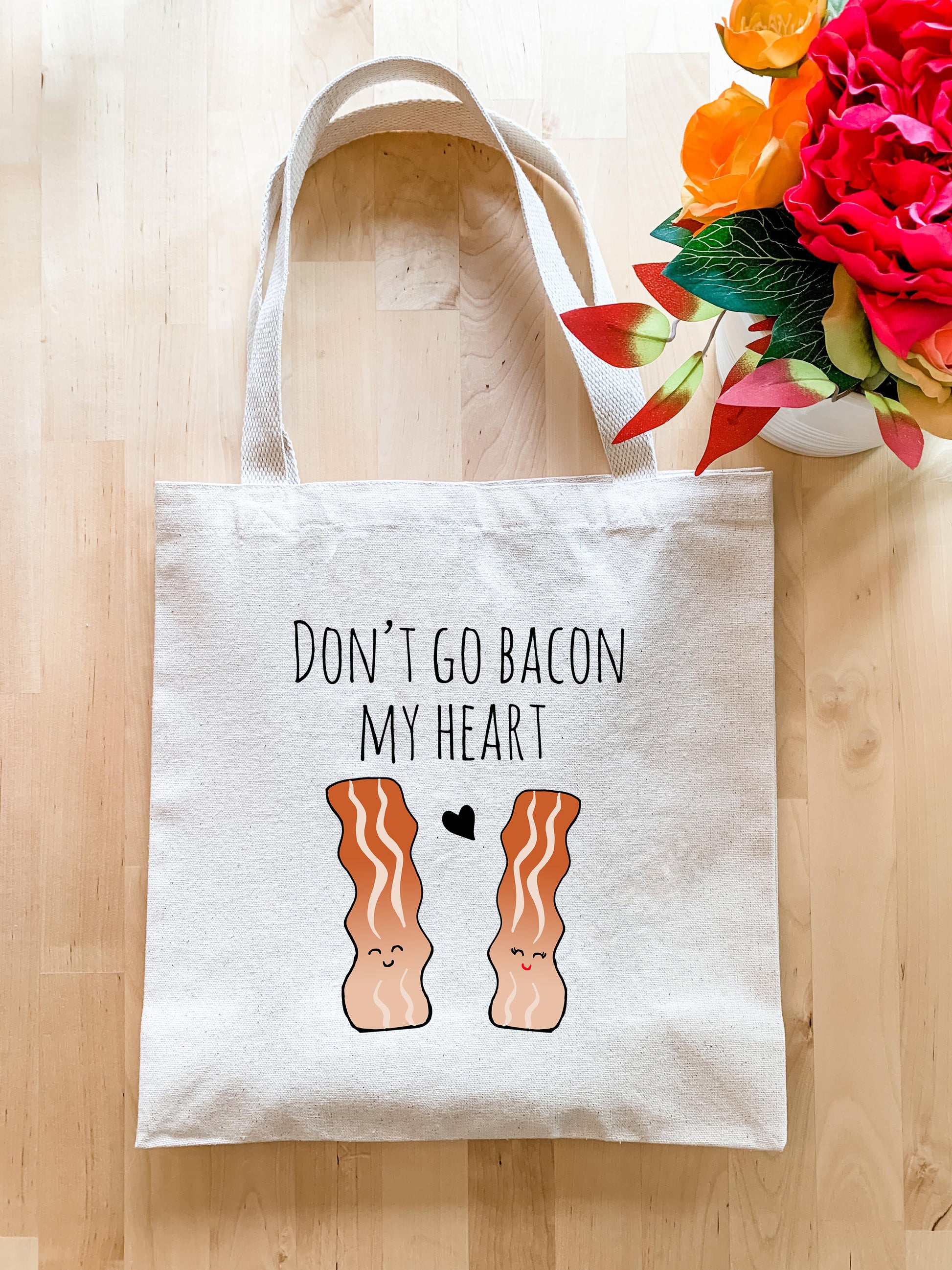 a tote bag with a picture of bacon on it