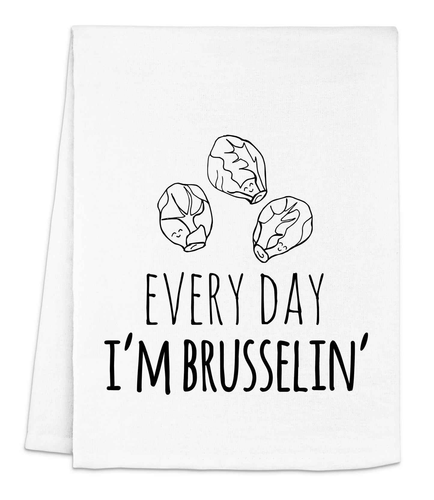 a white dish towel with black lettering that says every day i'm bruss