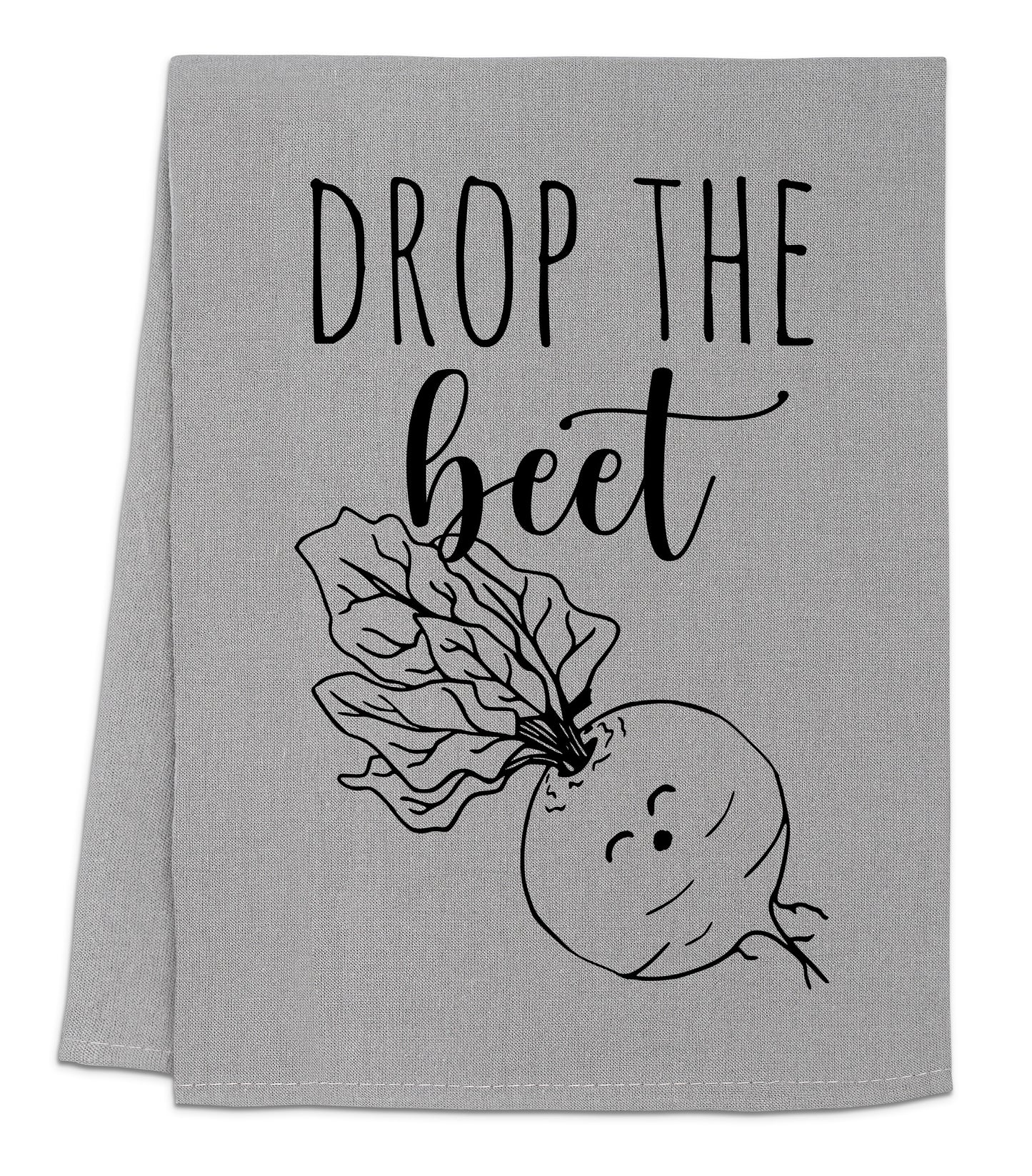 a towel with a picture of a radish and the words drop the bee