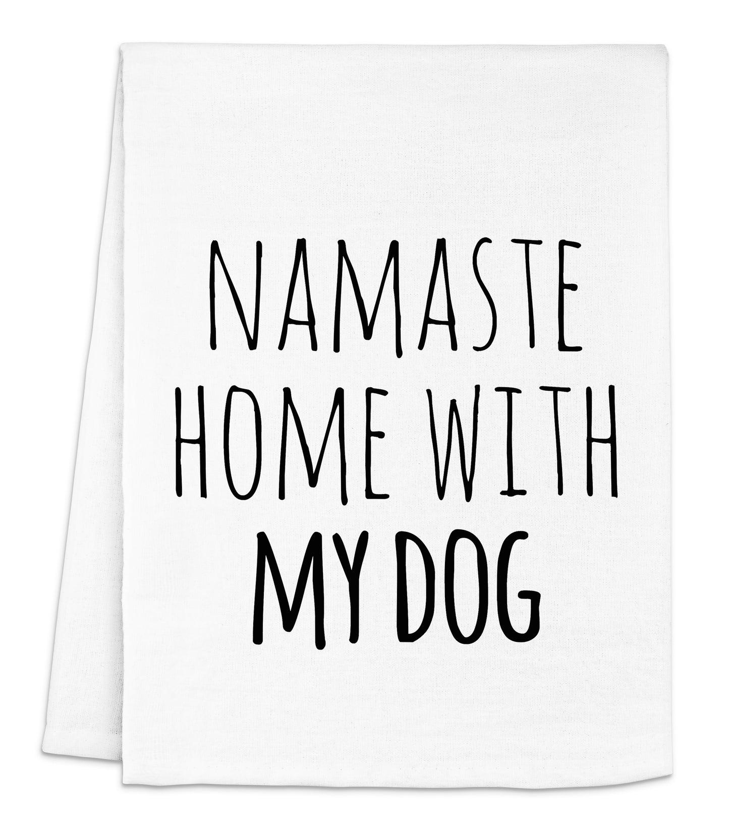 a white dish towel with the words namaste home with my dog on it