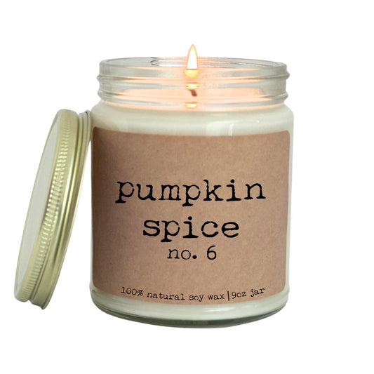 a candle with a label on it that says pumpkin spice