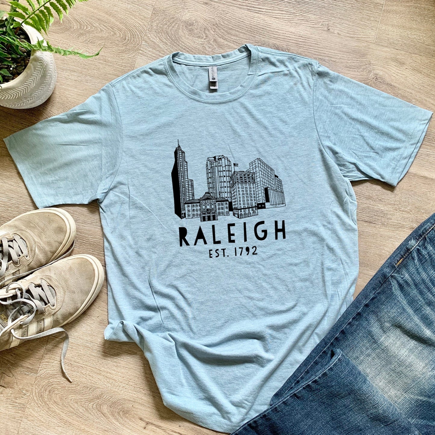 Raleigh Skyline (NC) - Men's / Unisex Tee - Stonewash Blue or Sage