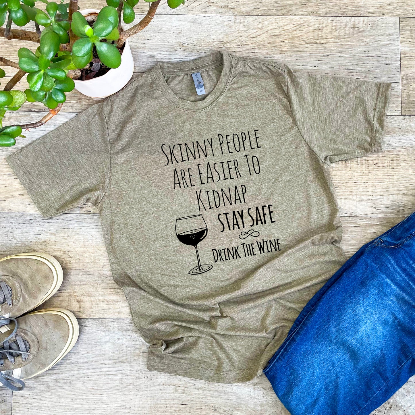 Skinny People Are Easier To Kidnap. Stay Safe. Drink The Wine - Men's / Unisex Tee - Stonewash Blue or Sage